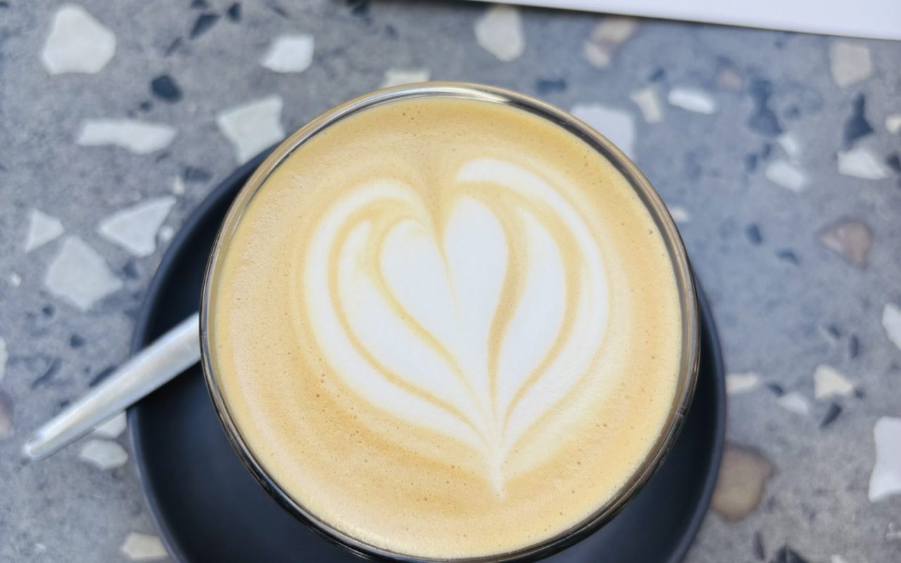 Latte with heart-shaped foam art