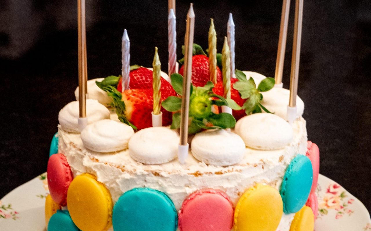 Birthday cake with lit candles